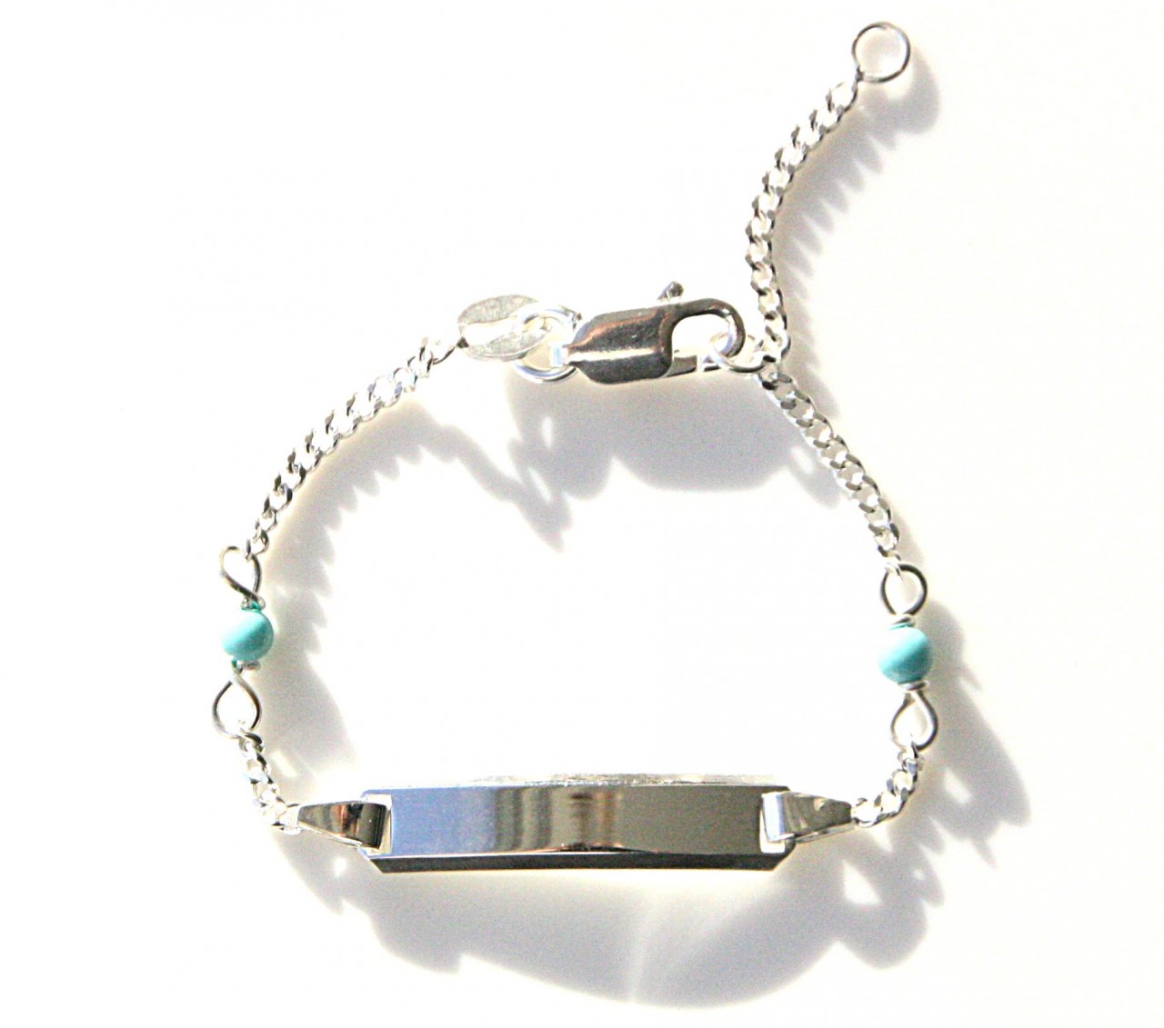 Baby armbandje zilver met naam en bolletjes van turquoise